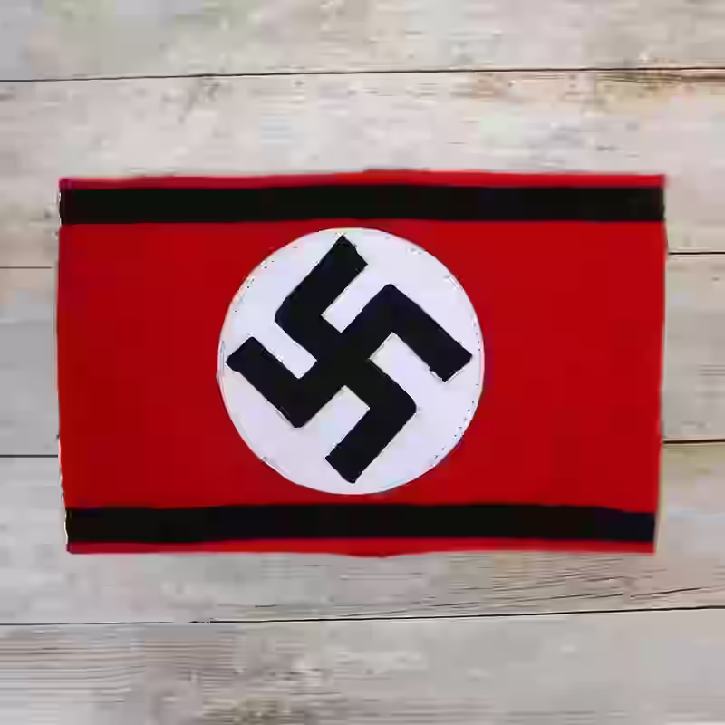 Waffen-SS Nazi Armband - WWII-era Waffen-SS nazi armband with machine-embroidered swastika on red cotton.