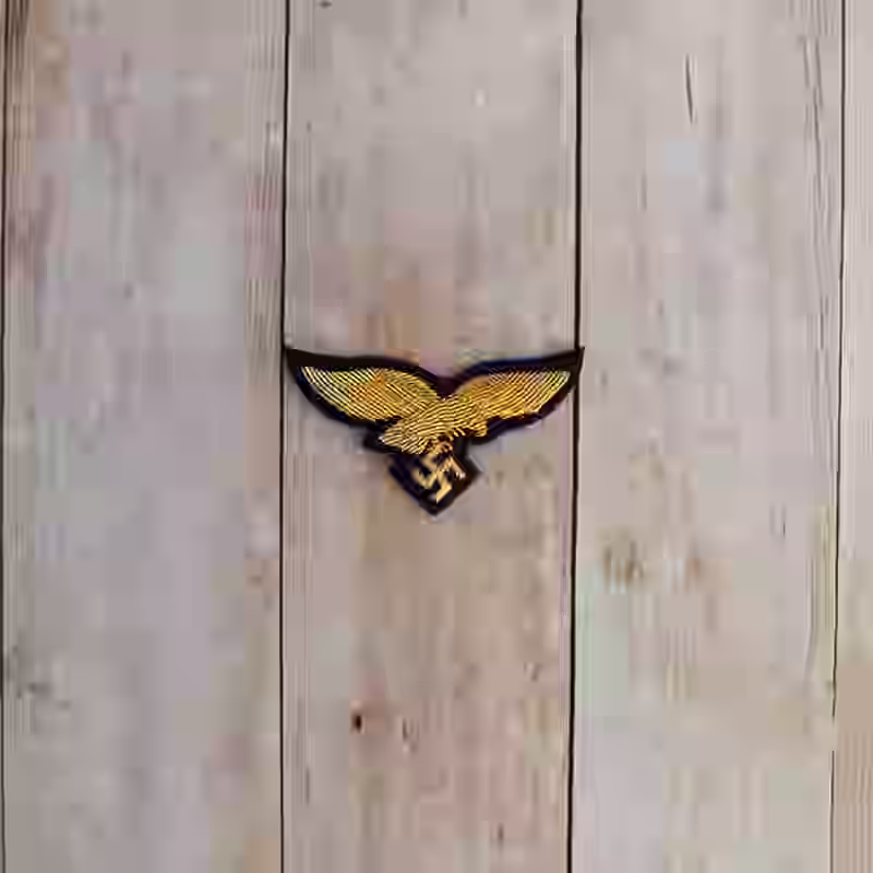 Luftwaffe Army General's Hand Embroidered Cap Eagle - WWII-era Luftwaffe generals hand embroidered cap eagle with gold aluminum wire on darkblue wool background.