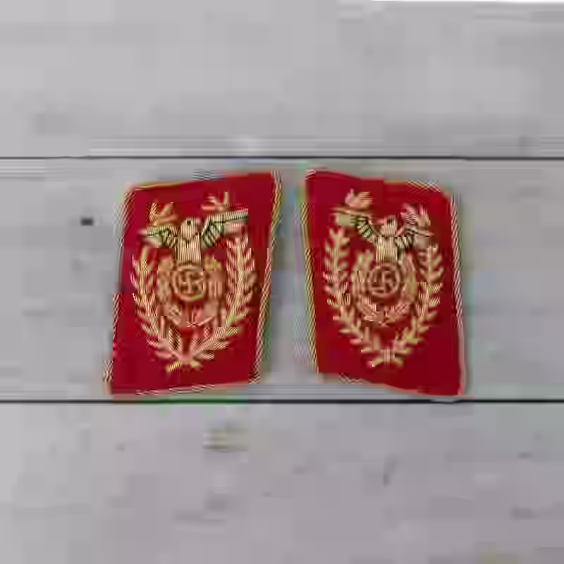 NSDAP 1939 Reichsleiter Collar Tabs - WWII-era NSDAP Reichsleiter collar tabs with gold thread on red wool.
