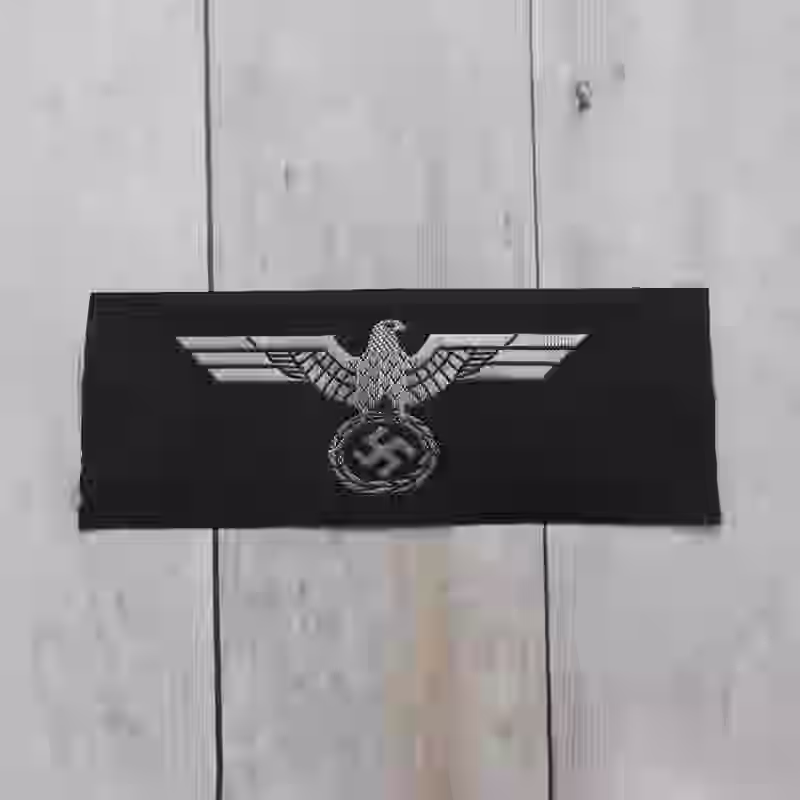 Panzer Officer's Silk Woven Black Breast Eagle - WWII-era Panzer officers’ silk woven breast eagle with silver thread on black.