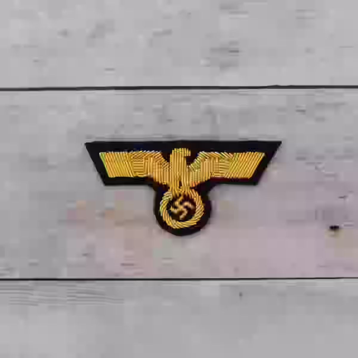 Wehrmacht Army Officer's Hand Embroidered Cap Eagle - WWII-era Wehrmacht officers’ hand-embroidered cap eagle with gold aluminum wire on black wool.