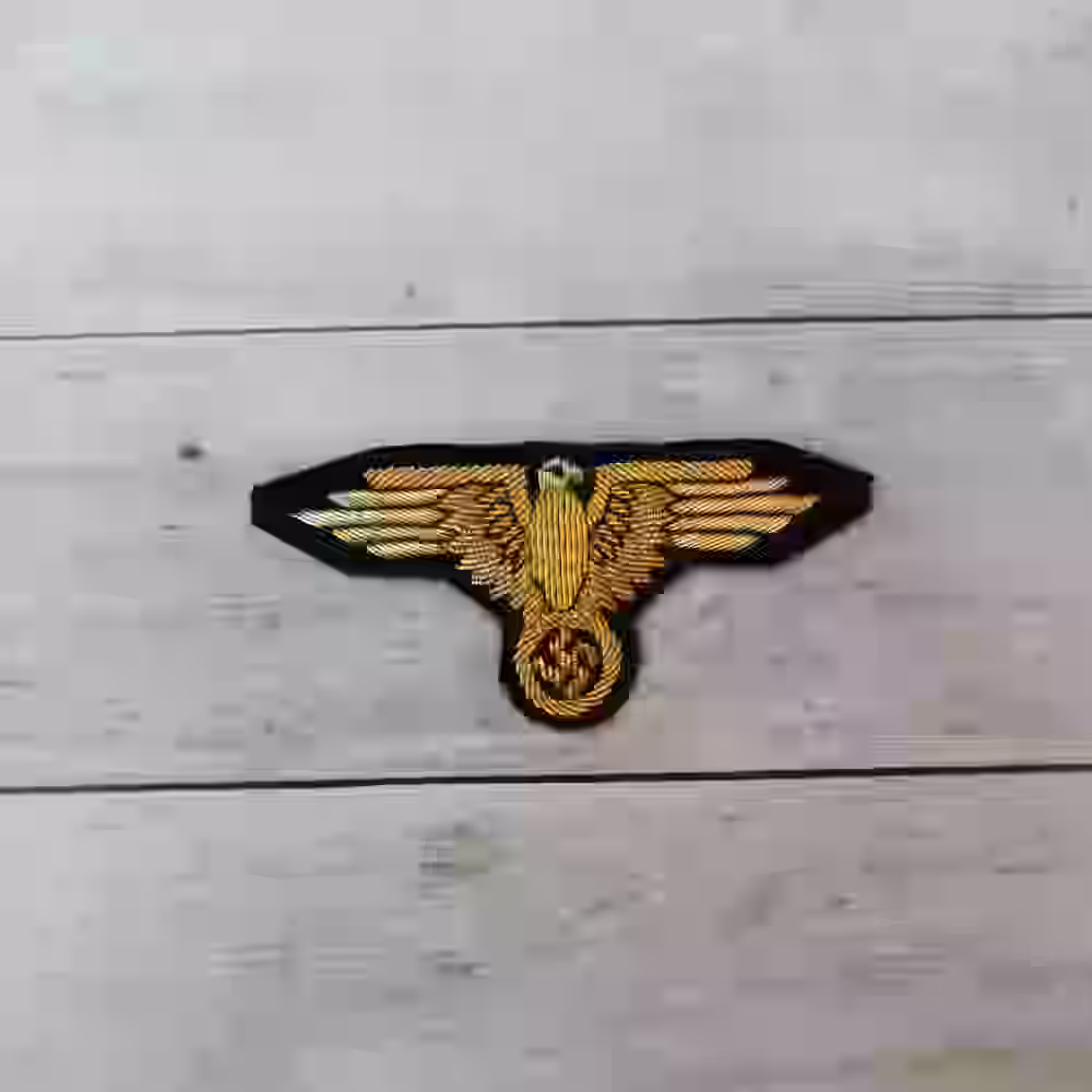Waffen SS Sepp Dietrich Oberstgruppenführer Hand Embroidered Arm Eagle - WWII-era Waffen-SS Oberstgruppenführer arm eagle with gold aluminum wire on black wool.