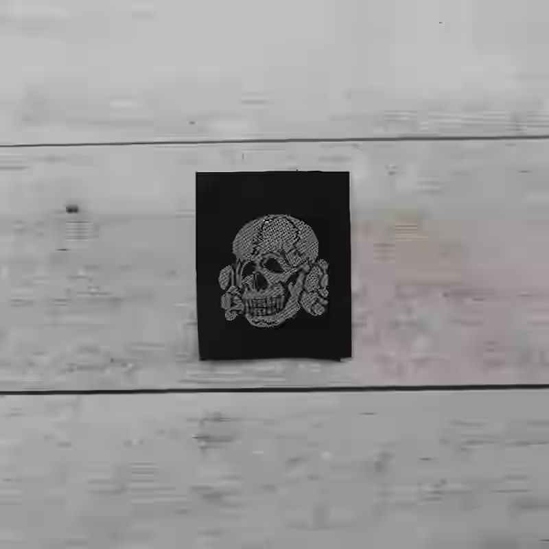 Waffen-SS Enlisted Men's Cap Skull - WWII German Waffen-SS enlisted skull insignia for field caps.