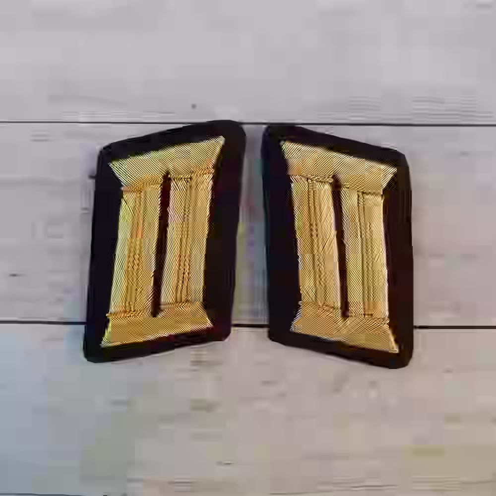 NSDAP Kreisleiter District Leader Collar Tabs - Hand-embroidered NSDAP Kreisleiter collar tabs with gold thread on dark maroon wool.