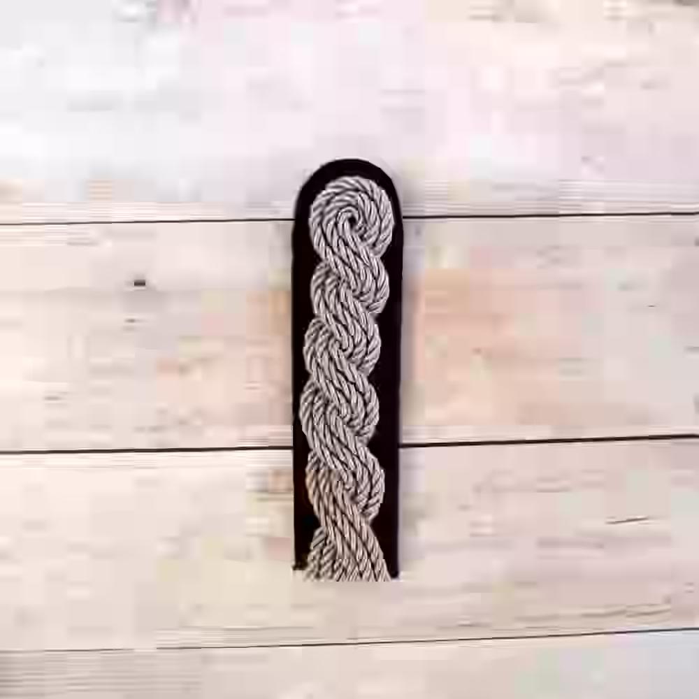 Allgemeine-SS Senior Officer's Single Shoulder Board - WWII-era Allgemeine SS senior officers’ single shoulder board with aluminum twist cord and black wool underlay for Sturmbannführer to Standartenführer ranks.