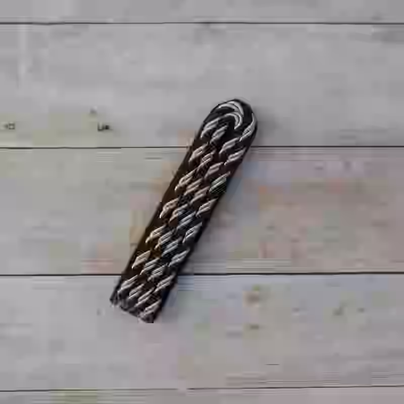 Allgemeine-SS Enlisted Men's Single Shoulder Board - WWII-era Allgemeine SS enlisted men’s single shoulder board with aluminum twist cord and black wool underlay for SS-Mann to Hauptscharführer ranks.