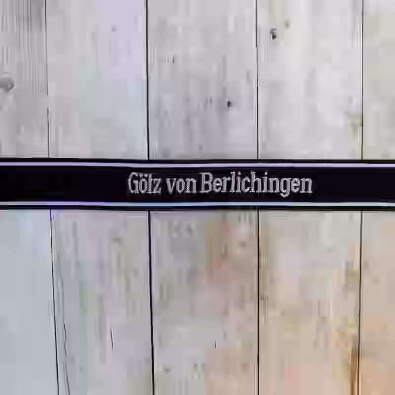Götz von Berlichingen EM Cuff Title - WWII-era Götz von Berlichingen enlisted men’s cuff title with grey thread on black woven silk base for 17th SS Panzergrenadier Division.