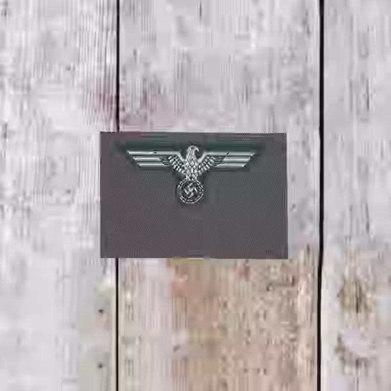 Wehrmacht Army Officer's Silk Woven Cap Eagle - WWII-era Wehrmacht army officer silk woven cap eagle in Be-Vo style with silver eagle on dark green background.