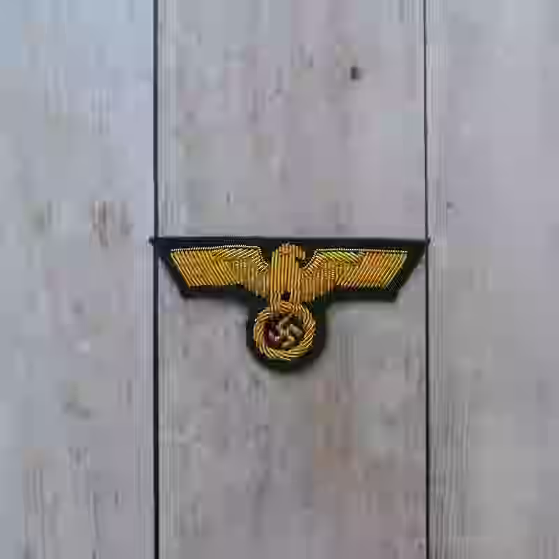 Wehrmacht Army Generals Hand Embroidered Cap Eagle - WWII-era Wehrmacht army generals hand embroidered cap eagle with gold aluminum wire on dark green wool background.
