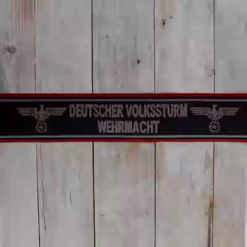 Deutscher Volkssturm Cuff Title - WWII-era Deutscher Volkssturm Be-Vo cuff title with silk woven background and darkgold thread lettering.