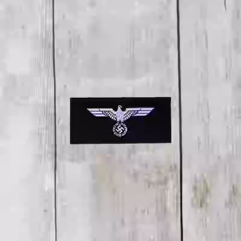 Panzer Enlisted Men's Silk Woven Cap Eagle M35 Uniform - WWII-era Panzer enlisted men silk woven cap eagle for M35 uniform with white thread eagle on black silk background.